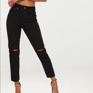 Black rip knee mom jeans